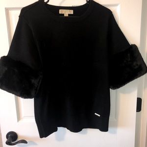 Black 3/4 sleeve Michael Kors top with faux fur sleeve detail